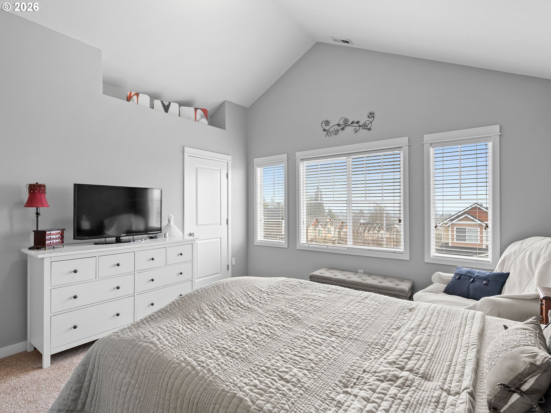 2513 Northwest 3rd Terrace Gresham, OR 97030 - Photo 29 of 38 a bedroom with a bed and a flat screen tv in it