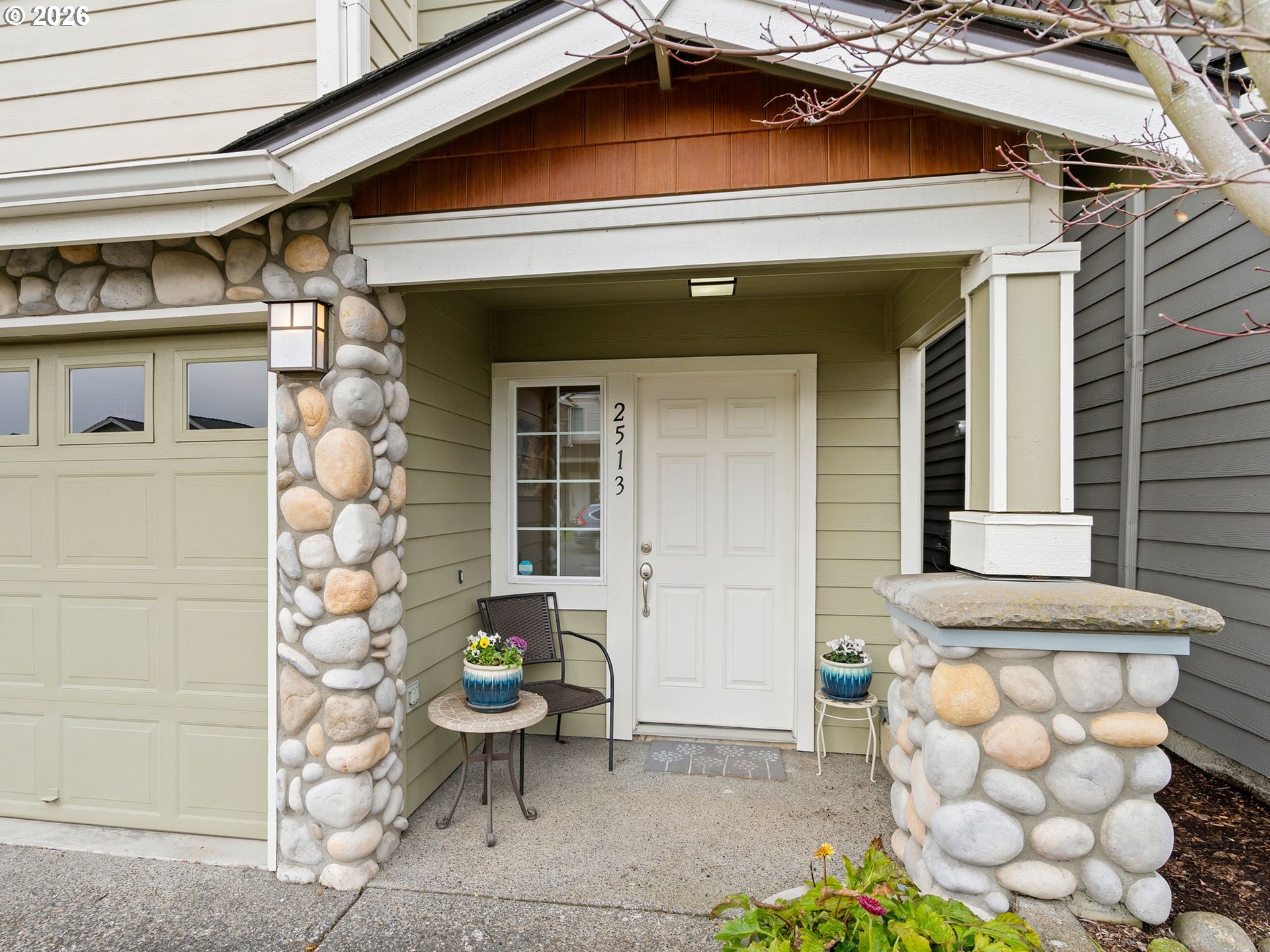 2513 Northwest 3rd Terrace Gresham, OR 97030 - Photo 3 of 38 a view of brick house with outdoor seating