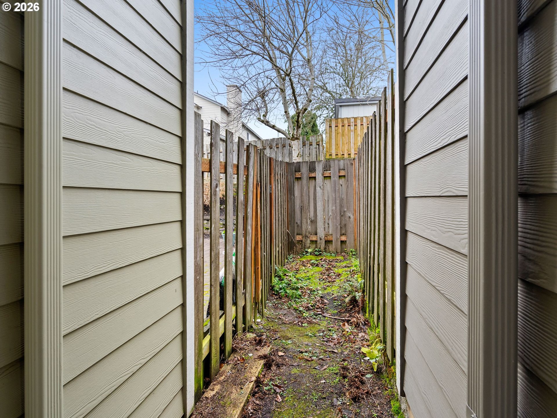 2513 Northwest 3rd Terrace Gresham, OR 97030 - Photo 37 of 38 a view of a house with a flower garden