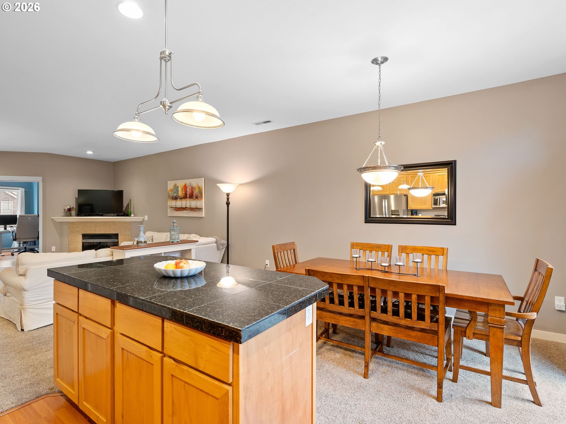 2513 Northwest 3rd Terrace Gresham, OR 97030 - Photo 8 of 38 a kitchen with a dining table and chairs