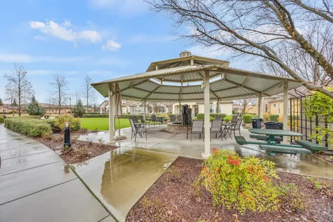 a view of swimming pool with a yard