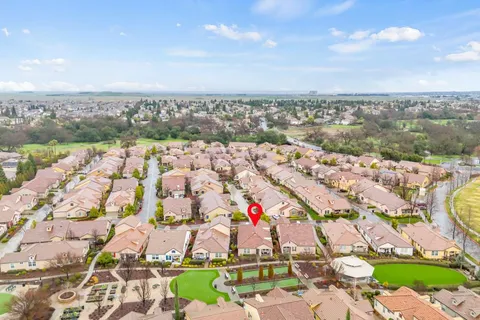 an aerial view of a city with lots of residential buildings