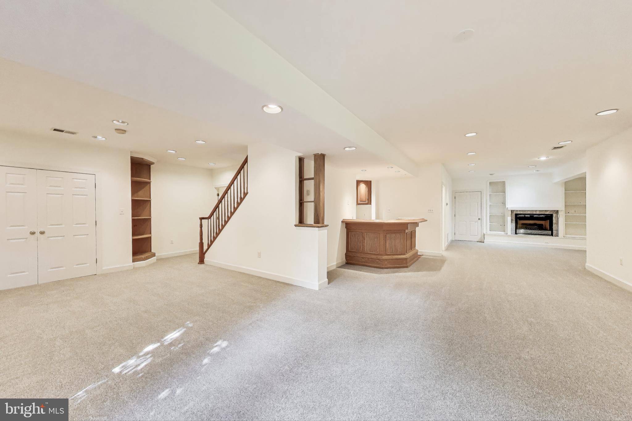 10106 Waterside Drive Burke, VA 22015 - Photo 20 of 30 a view of a livingroom with kitchen and furniture