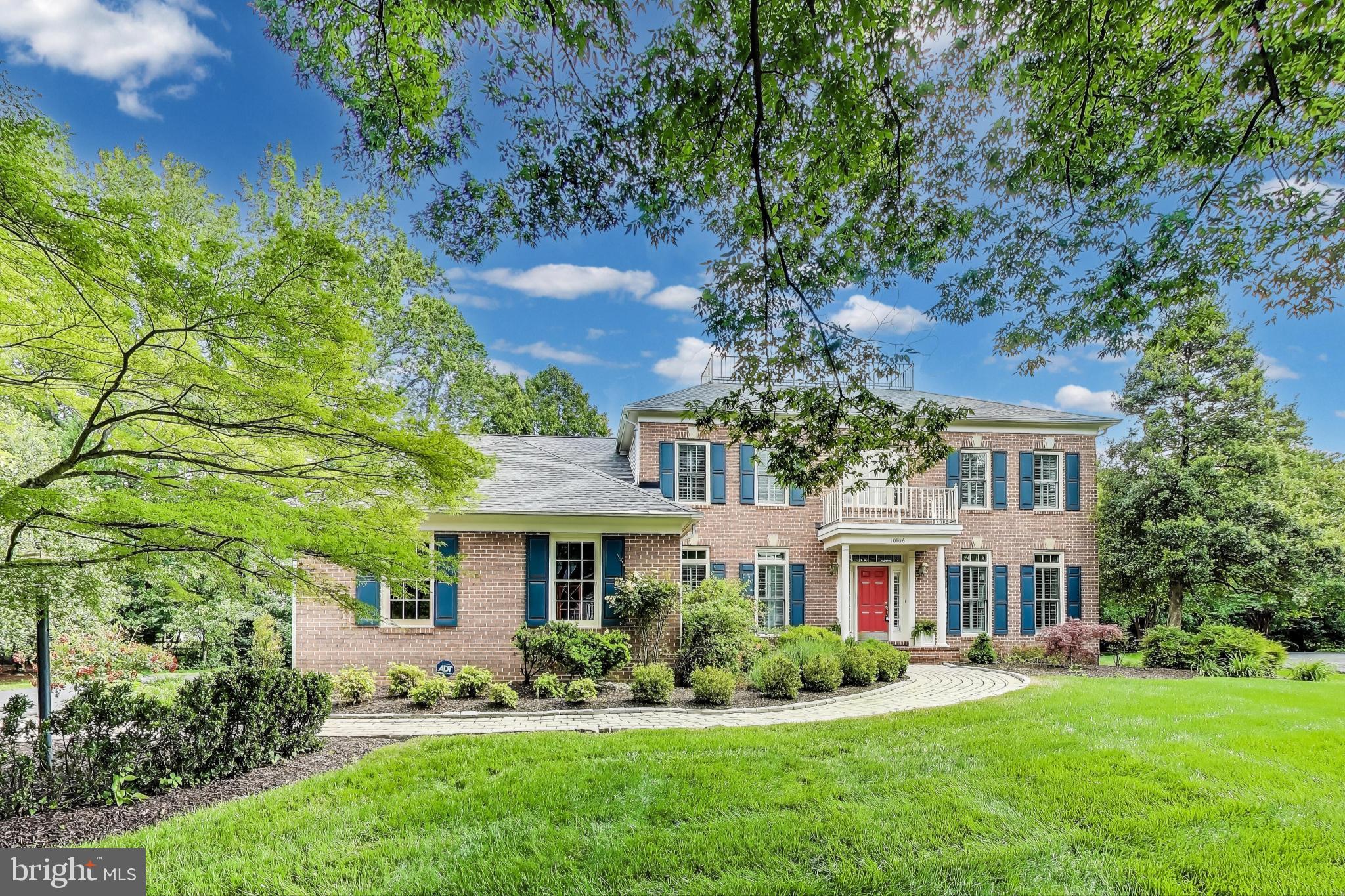 10106 Waterside Drive Burke, VA 22015 - Photo 2 of 30 a front view of a house with a yard