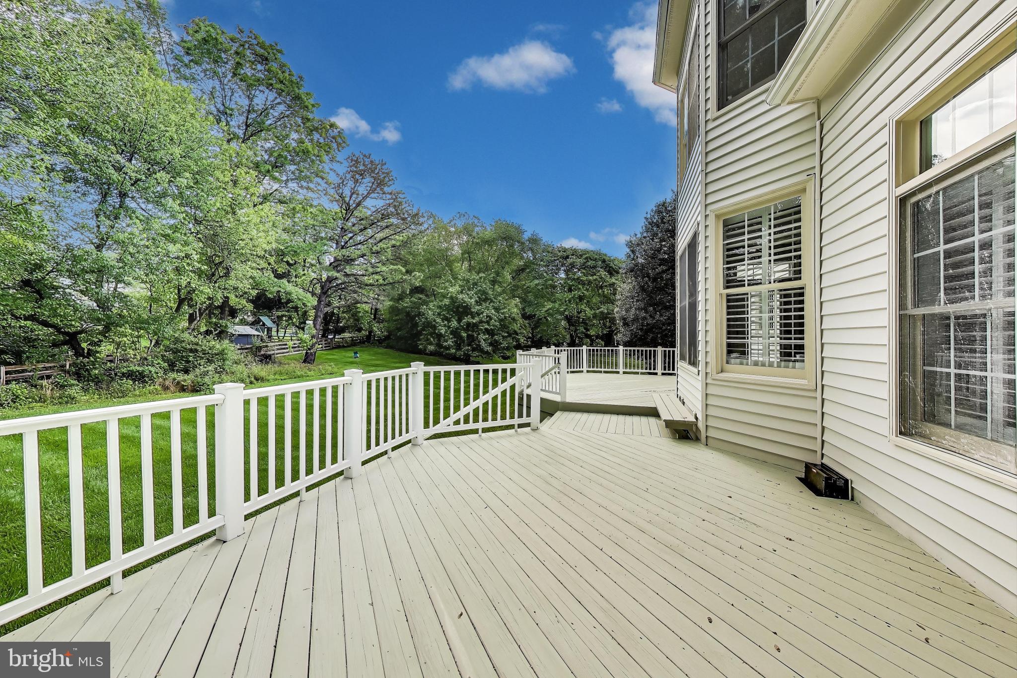 10106 Waterside Drive Burke, VA 22015 - Photo 26 of 30 a view of a wooden deck