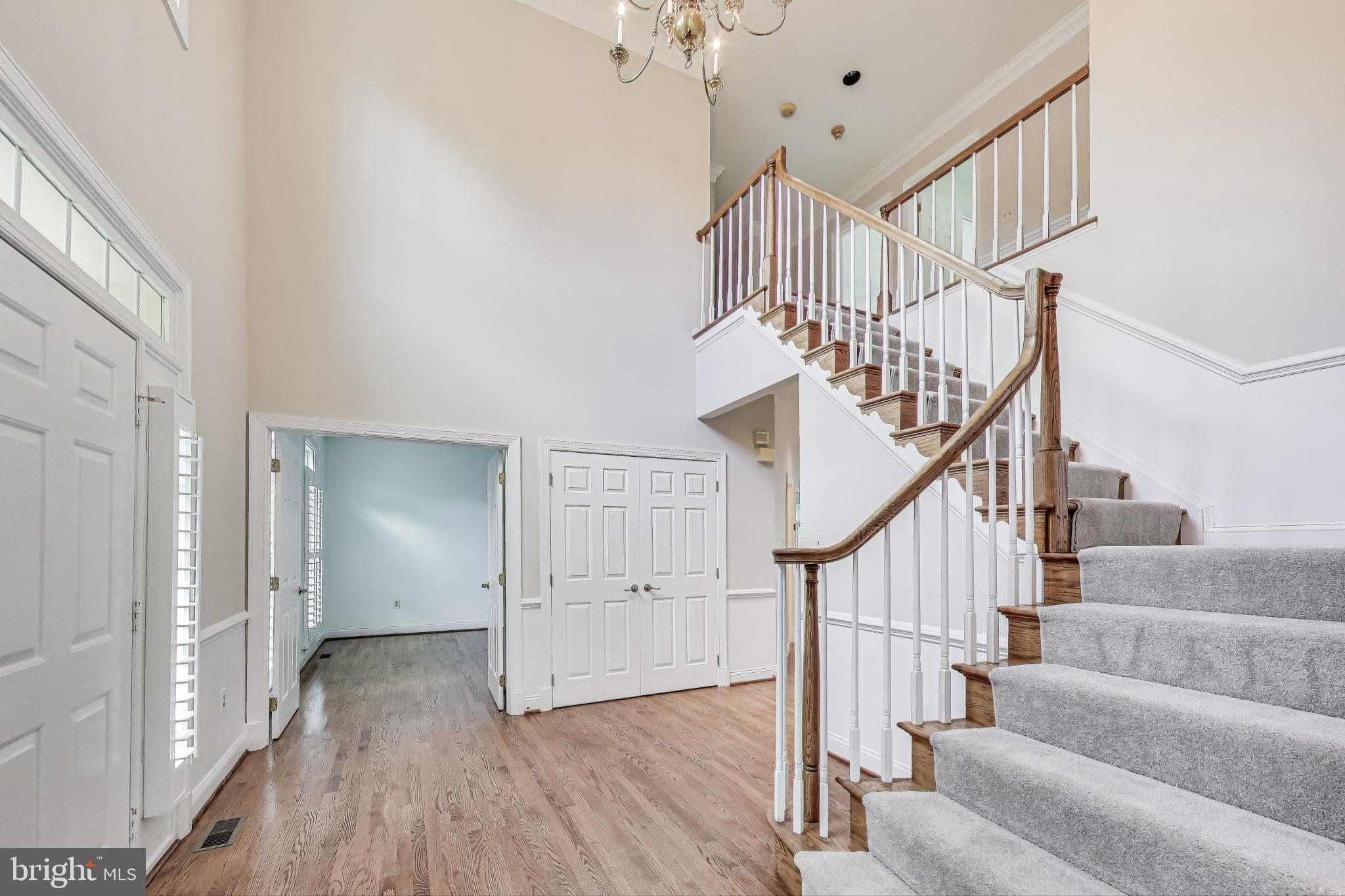 10106 Waterside Drive Burke, VA 22015 - Photo 3 of 30 a view of entryway and hall with wooden floor
