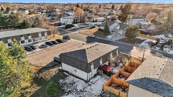 an aerial view of a house with a garden