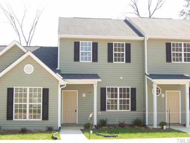 844 Horton Road, Unit 69 Durham, NC 27704 - Photo 1 of 5 a front view of a house with a yard
