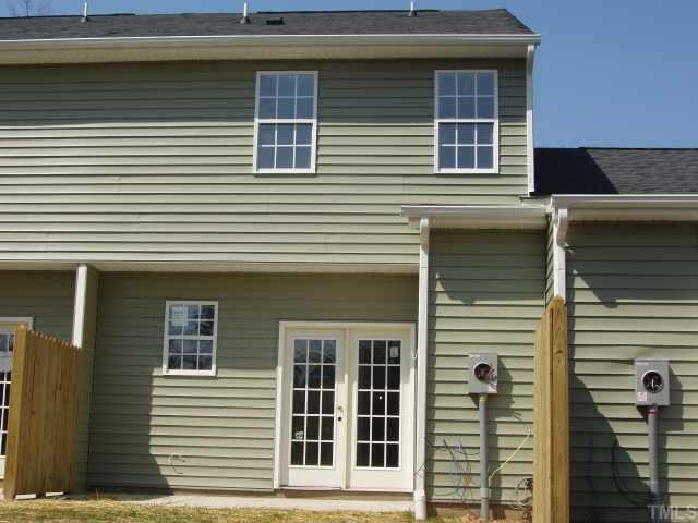 844 Horton Road, Unit 69 Durham, NC 27704 - Photo 2 of 5 a view of a house with a door and a large window