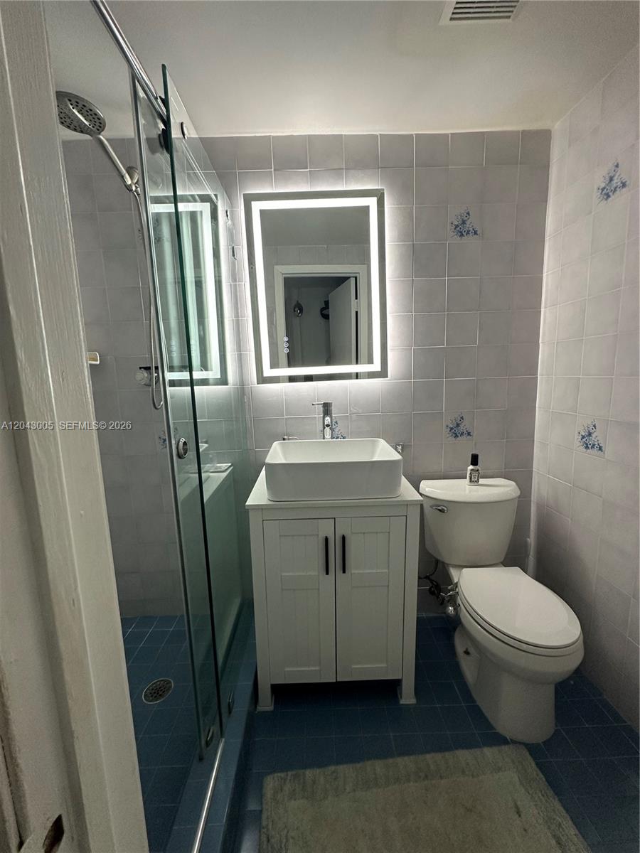 5931 Southwest 46th Street Miami, FL 33155 - Photo 29 of 35 Blue/Grey Bathroom 1