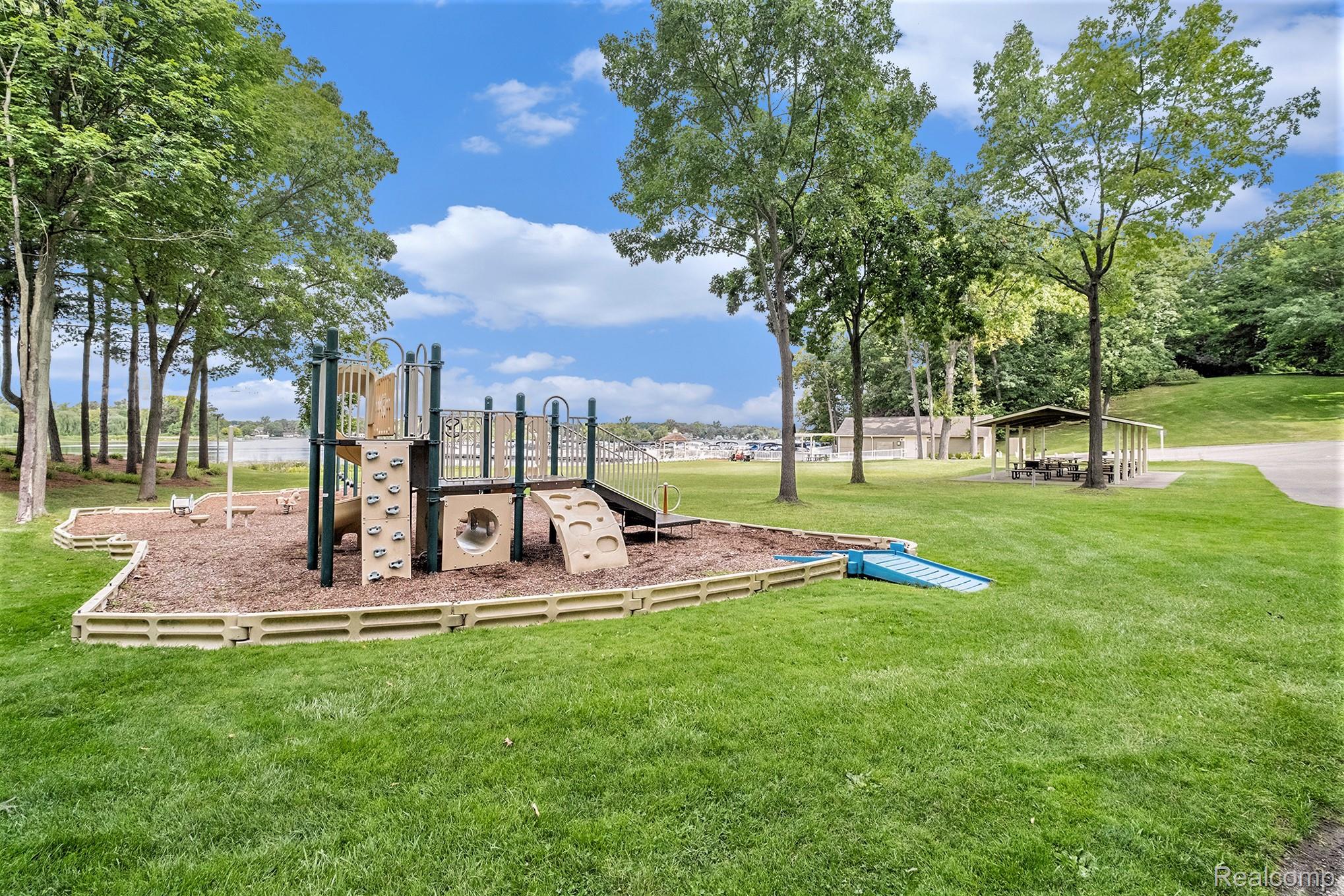 4179 St Andrews Street Howell, MI 48843 - Photo 60 of 75 Community play area, pavilion, & beach