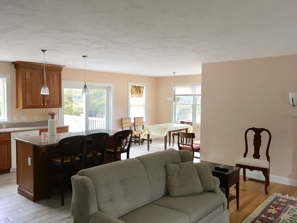 372 Phillips Road Sandwich, MA 02562 - Photo 2 of 3 a living room with furniture and window