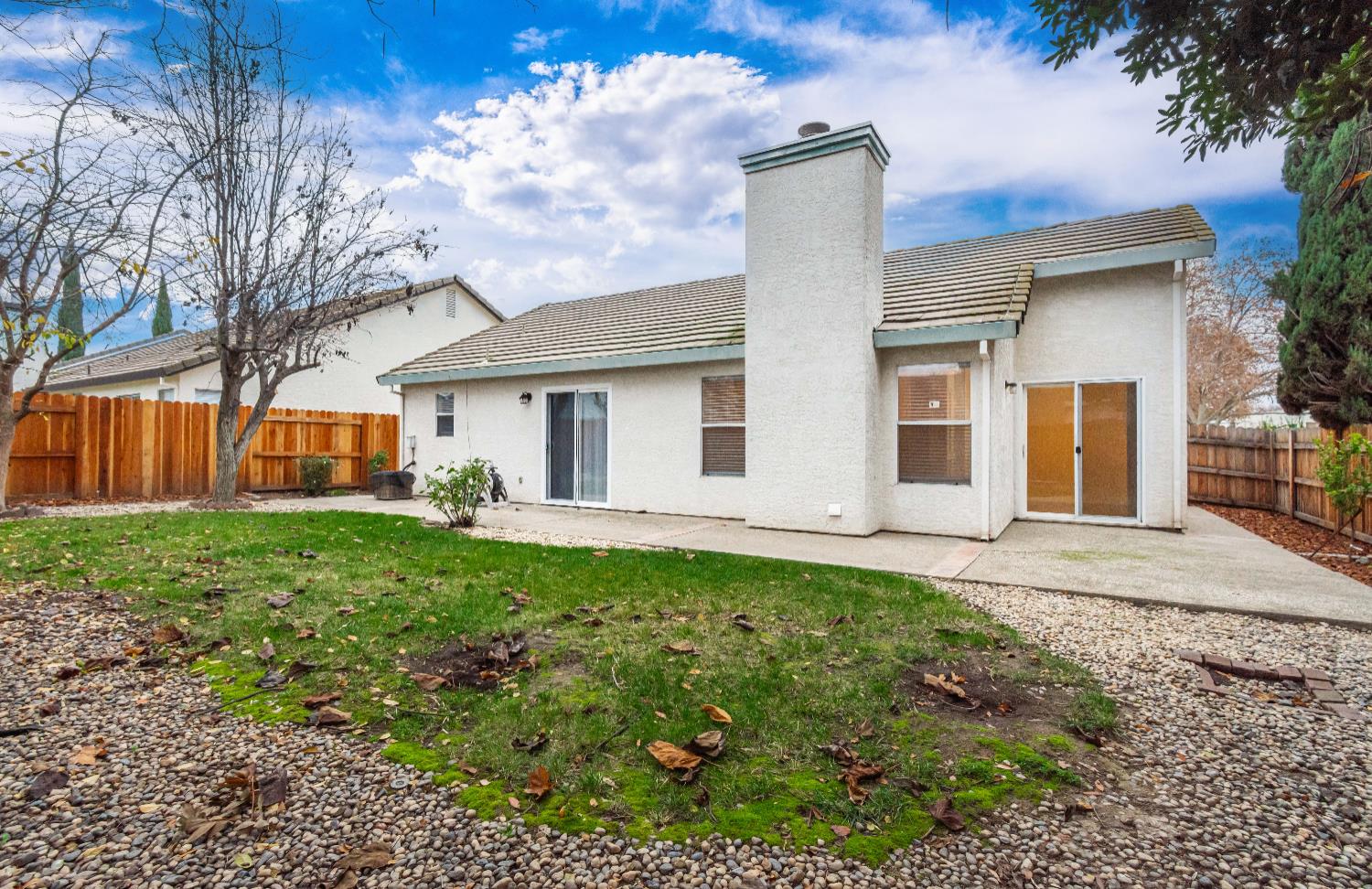 8245 Calleystone Way Antelope, CA 95843 - Photo 29 of 33 a front view of a house with garden