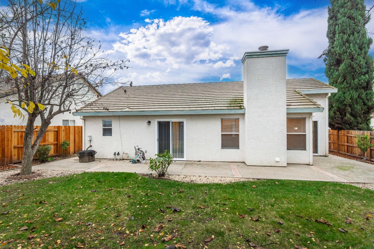 8245 Calleystone Way Antelope, CA 95843 - Photo 30 of 33 a front view of a house with patio