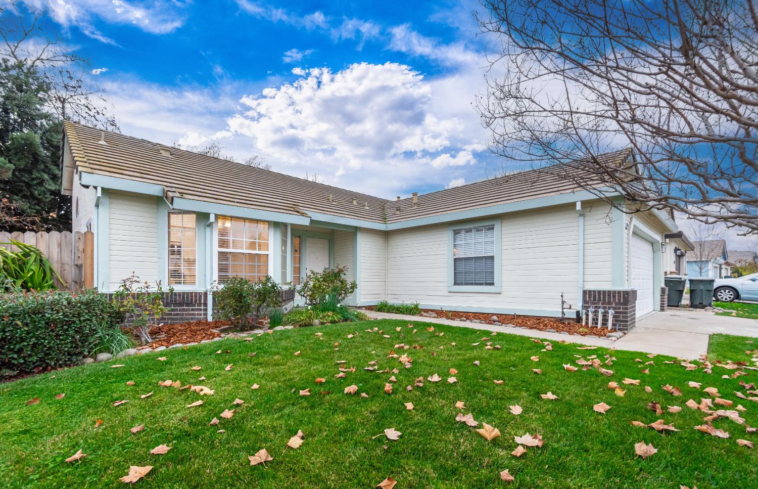 8245 Calleystone Way Antelope, CA 95843 - Photo 32 of 33 a front view of house with yard and outdoor seating