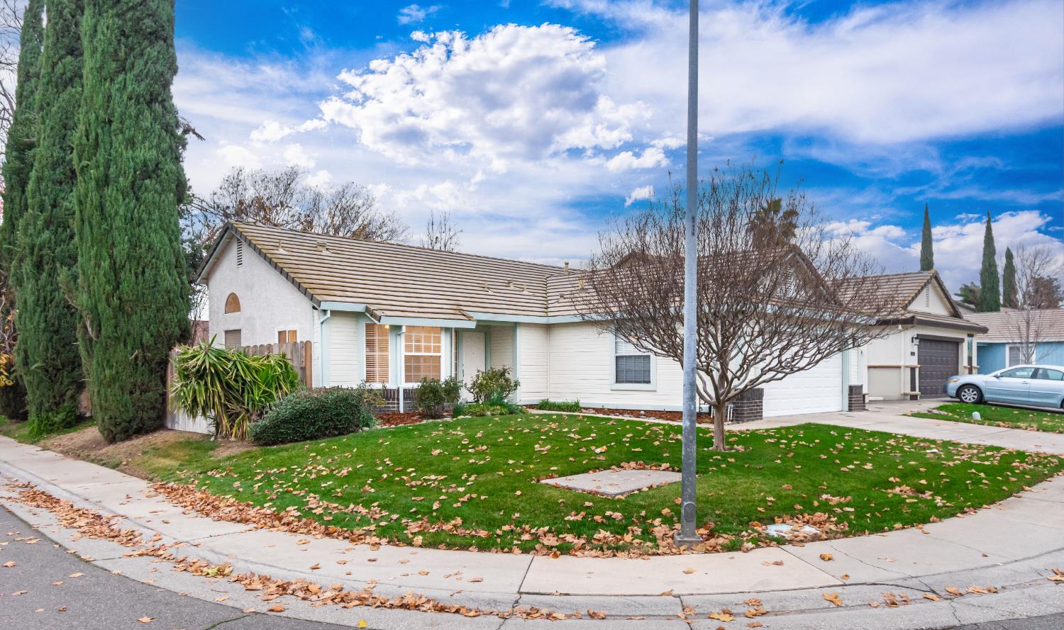 8245 Calleystone Way Antelope, CA 95843 - Photo 33 of 33 a front view of a house with garden
