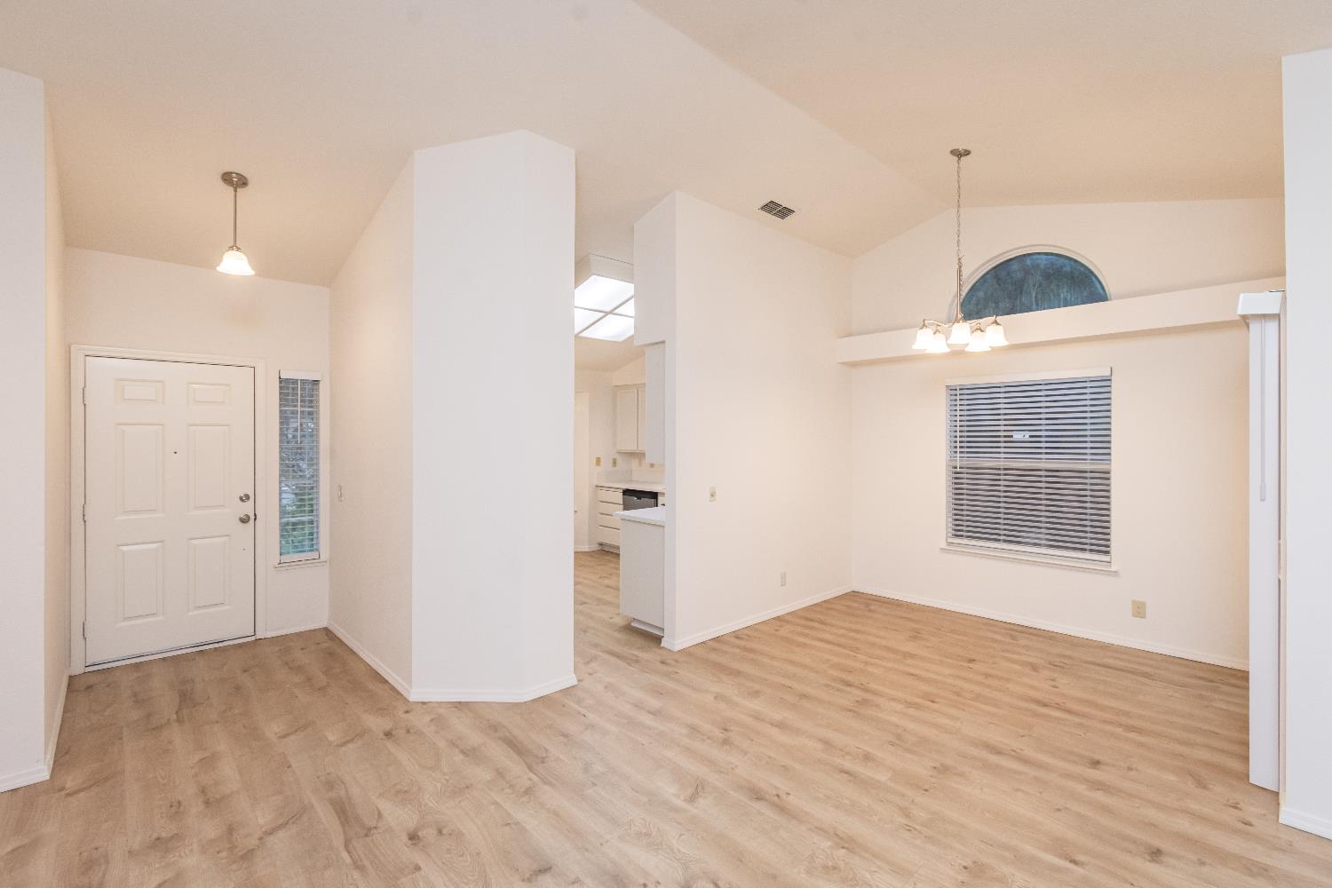 8245 Calleystone Way Antelope, CA 95843 - Photo 7 of 33 a view of a room with a ceiling fan and window