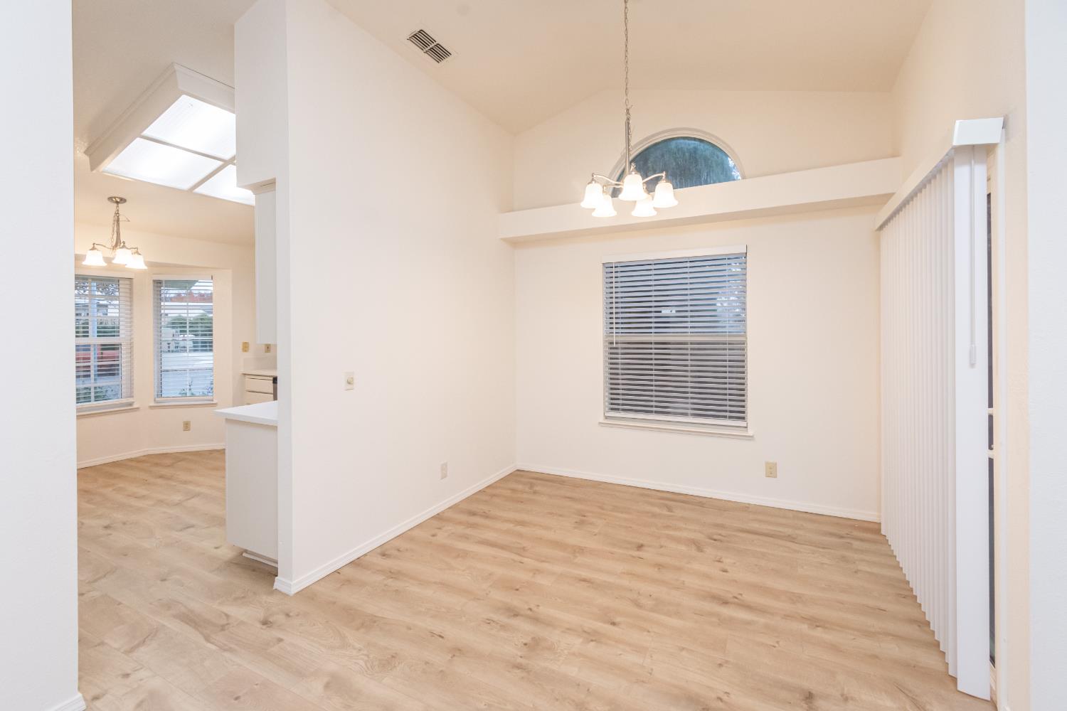 8245 Calleystone Way Antelope, CA 95843 - Photo 8 of 33 a view of a room with wooden floor and cabinet