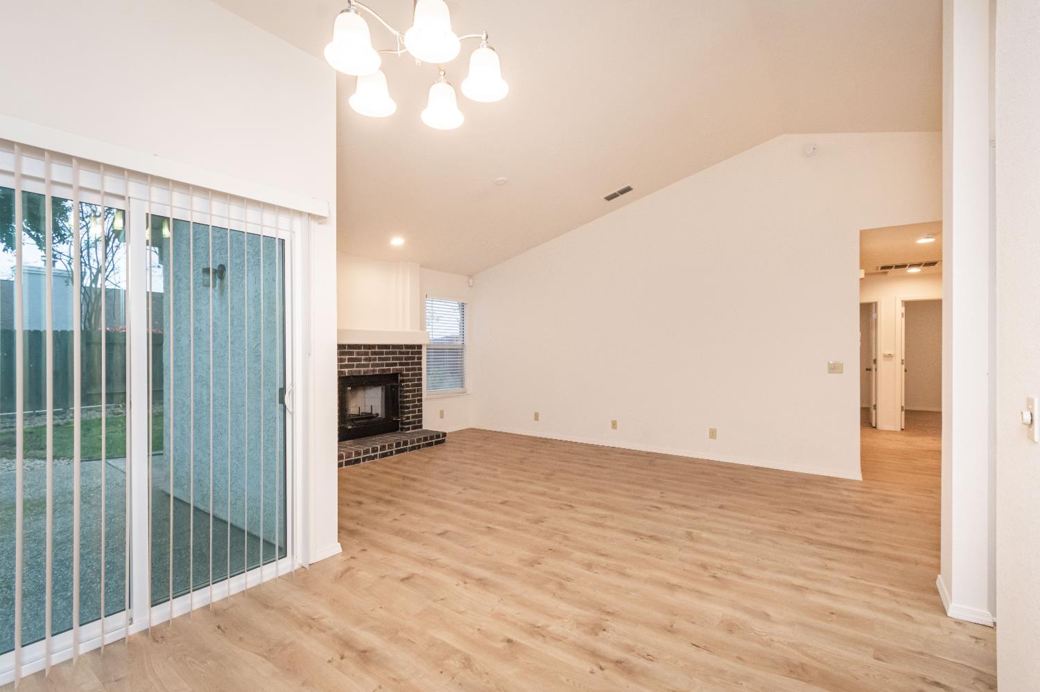 8245 Calleystone Way Antelope, CA 95843 - Photo 9 of 33 a view of a livingroom with a fireplace
