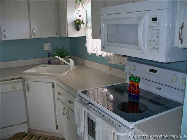 1977 Southwest Palm City Road, Unit 40F Stuart, FL 34994 - Photo 8 of 25 Kitchen. Kitchen has been updated with newer sink and faucet