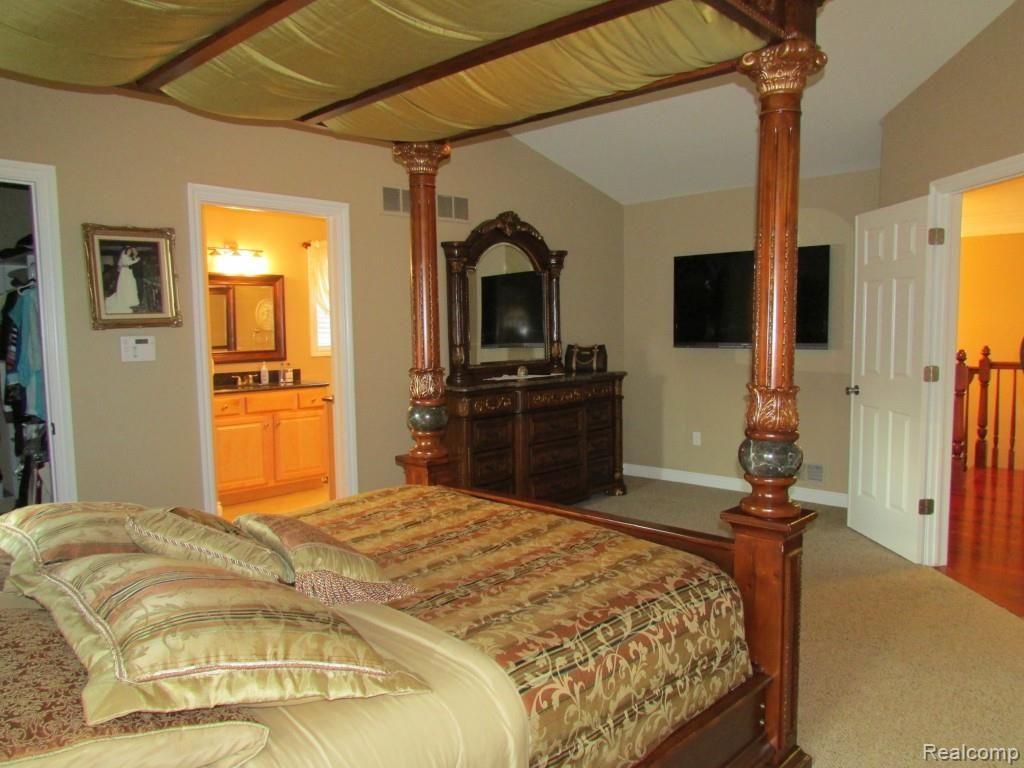 3052 St Clair Drive Rochester, MI 48309 - Photo 20 of 34 Master Bedroom Features Double Doors and Attached Bath