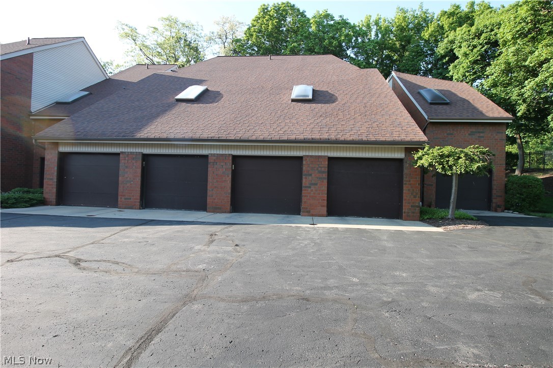 4695 Mayfield Road, Unit D South Euclid, OH 44121 - Photo 22 of 22 Single condo garage is the 3rd from the left