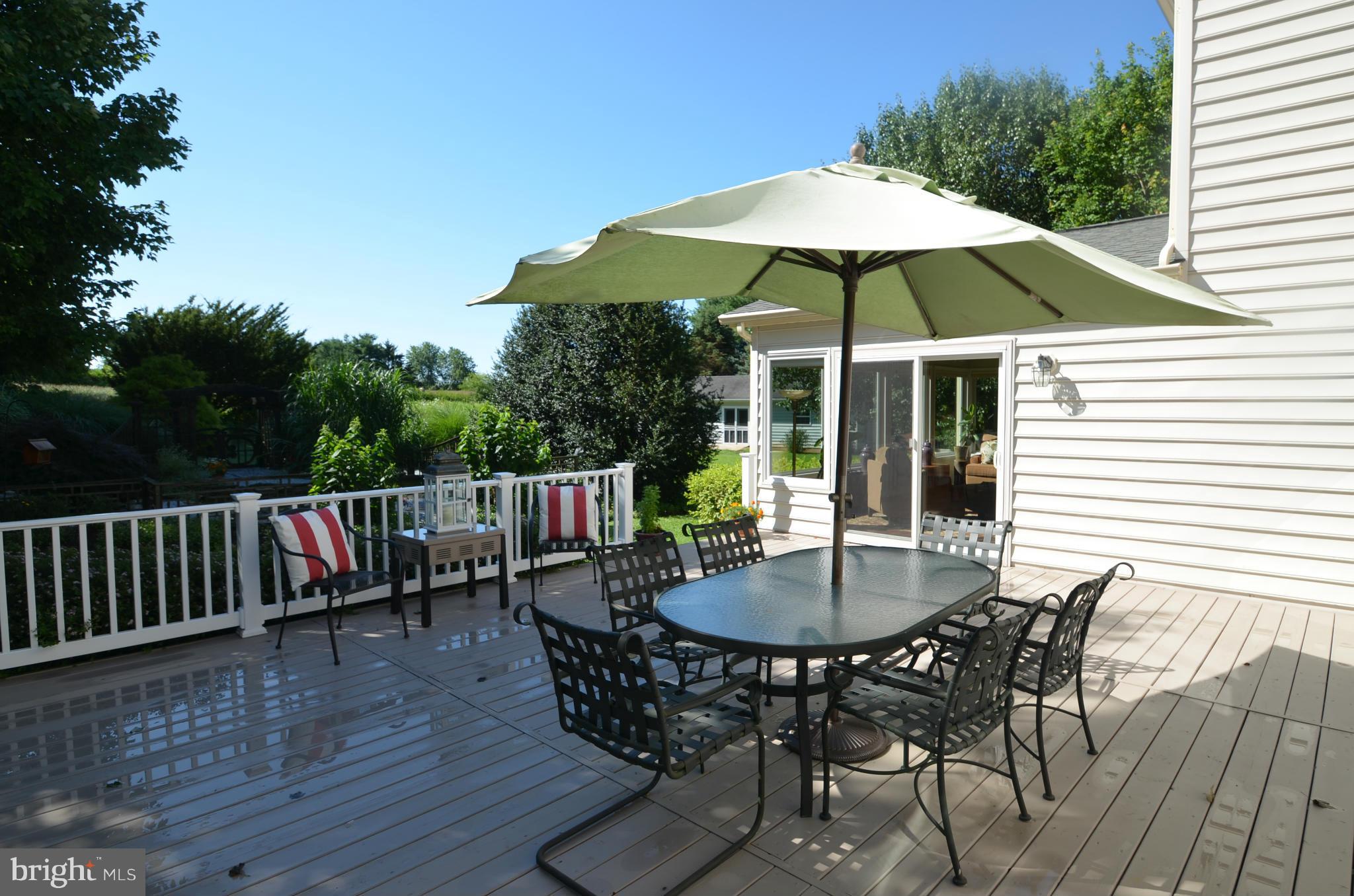 3315 Mt Carmel Road Upperco, MD 21155 - Photo 22 of 30 a table and chairs in patio