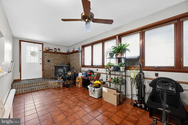 a view of a workspace with furniture