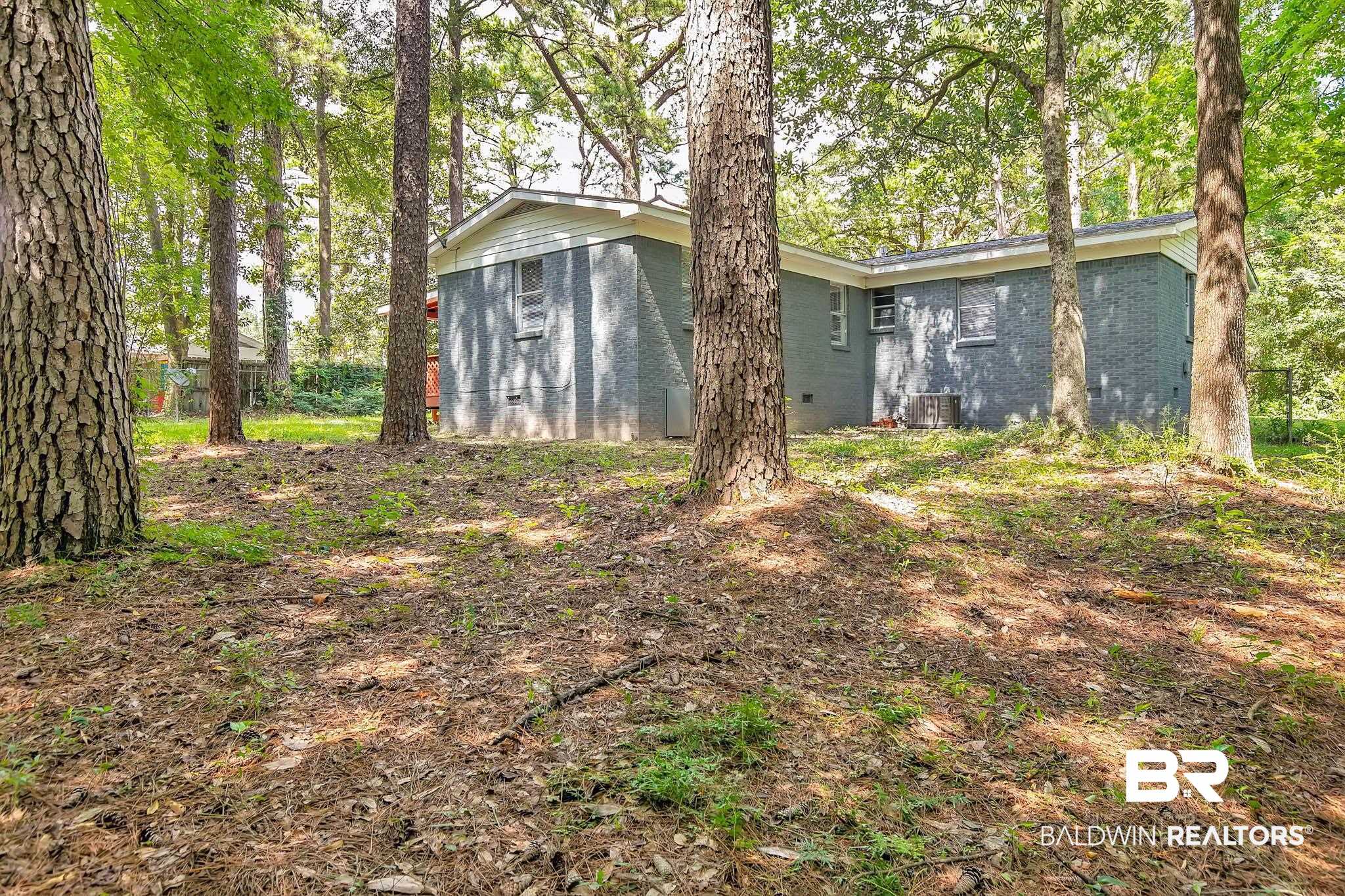 3304 Armond Drive Mobile, AL 36605 - Photo 46 of 62 View of home's exterior featuring brick siding