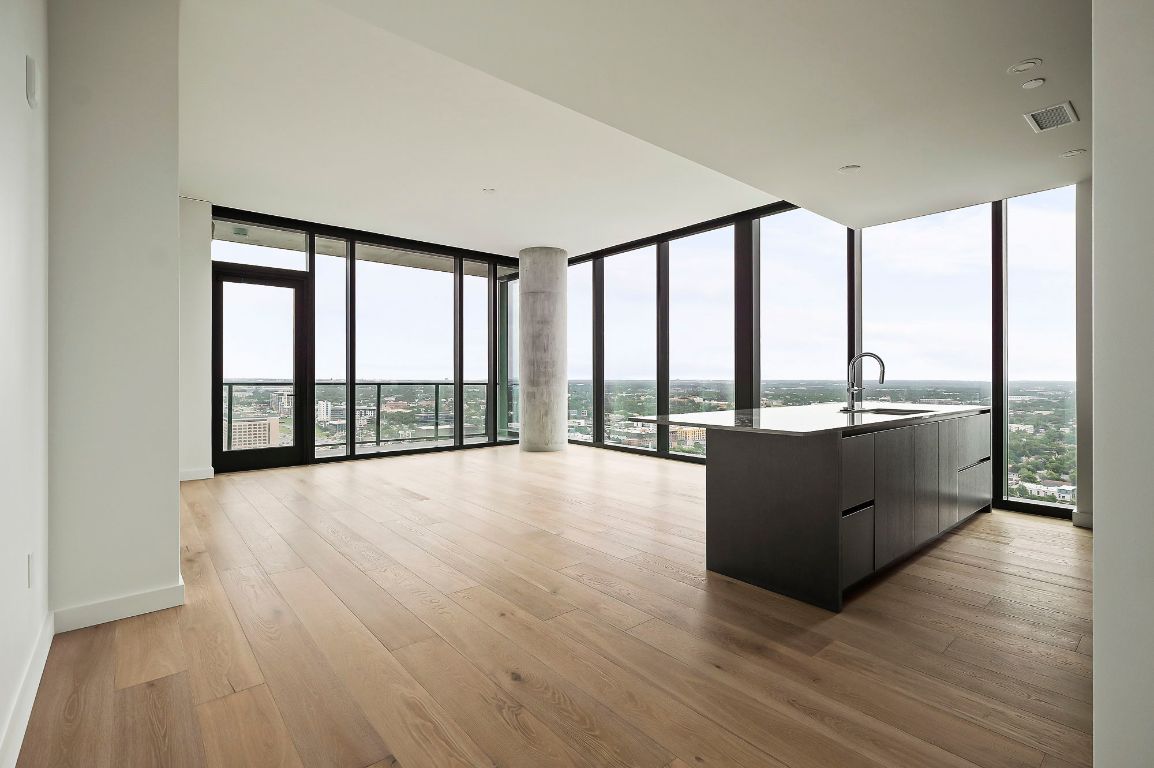 610 Davis Street, Unit 2812 Austin, TX 78701 - Photo 4 of 32 a large room with a large window