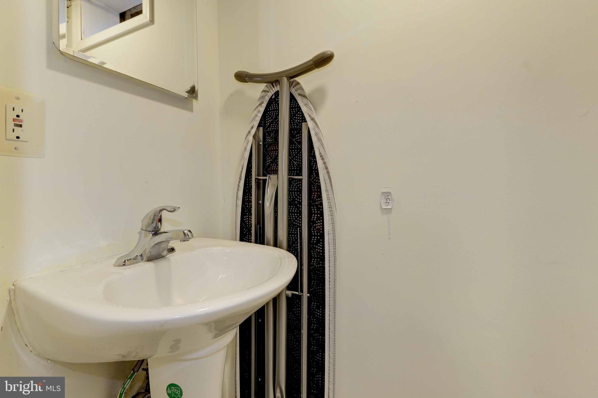 1235 Haverhill Road Baltimore, MD 21229 - Photo 29 of 35 Lower Level Powder Room