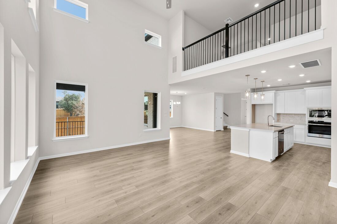 1821 Plum Tree Way Georgetown, TX 78628 - Photo 14 of 35 a view of kitchen with furniture and wooden floor