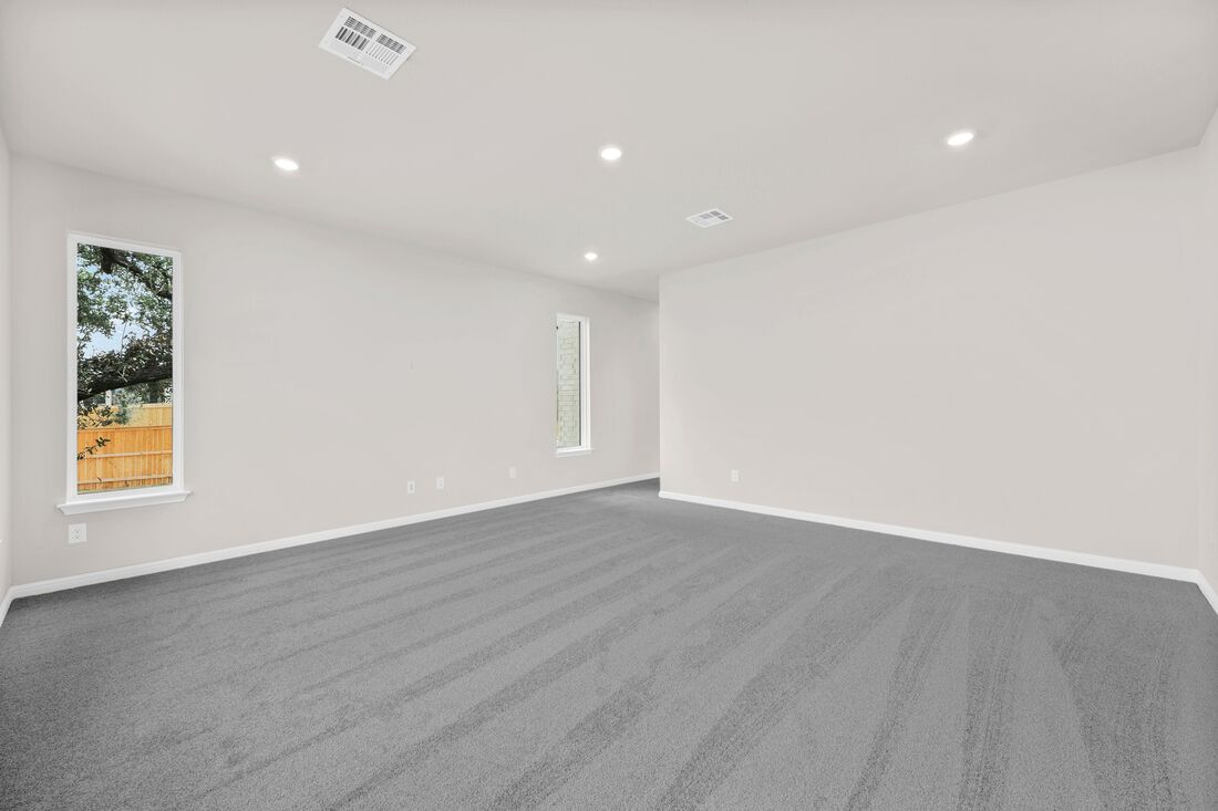 1821 Plum Tree Way Georgetown, TX 78628 - Photo 18 of 35 an empty room with wooden floor and window