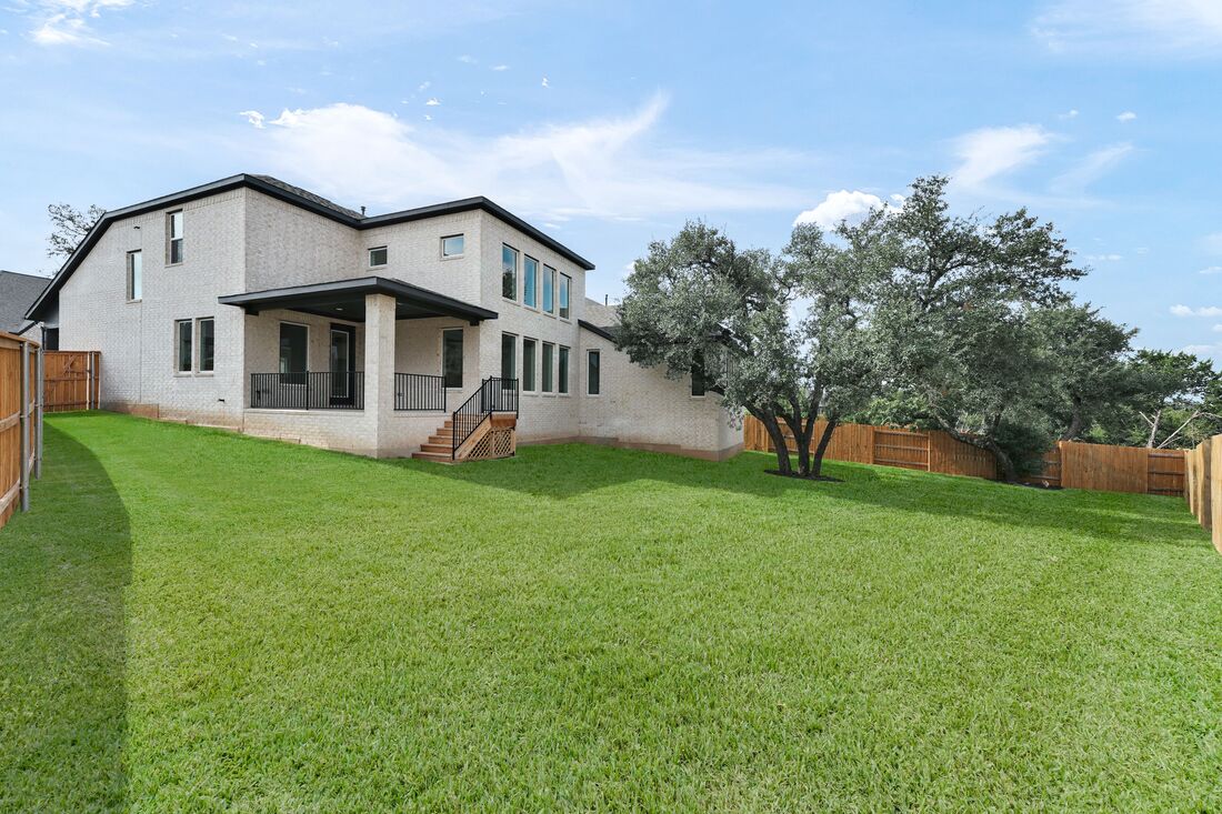 1821 Plum Tree Way Georgetown, TX 78628 - Photo 21 of 35 a front view of a house with garden