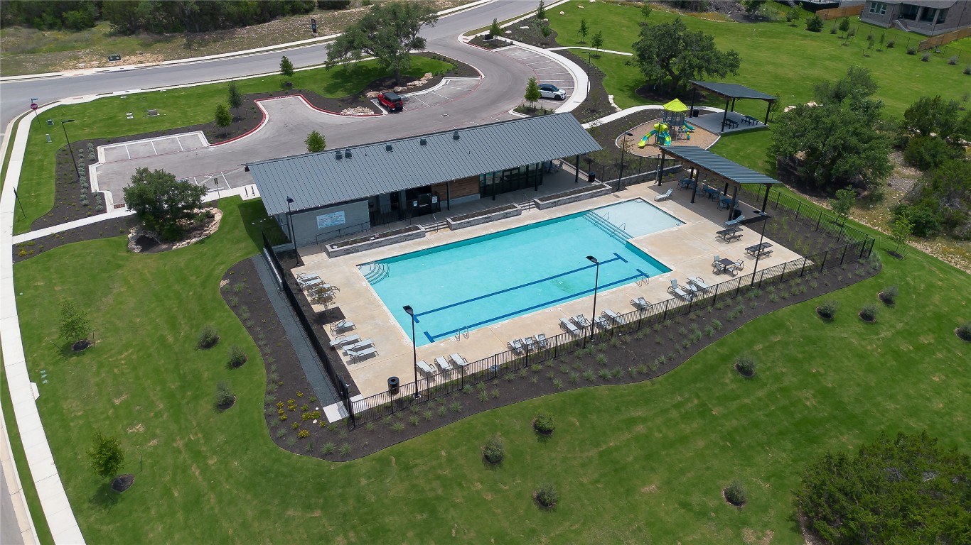 1821 Plum Tree Way Georgetown, TX 78628 - Photo 27 of 35 an aerial view of a tennis ground and a garden