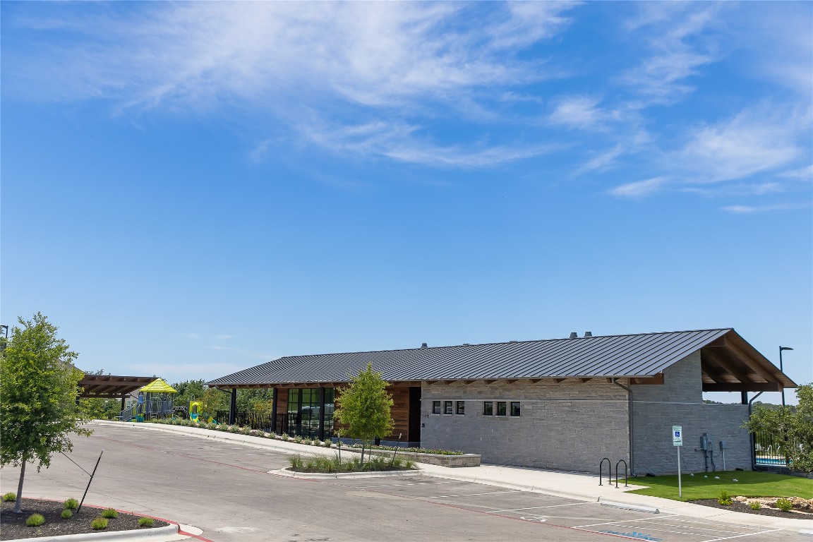1821 Plum Tree Way Georgetown, TX 78628 - Photo 30 of 35 a front view of a house with a yard