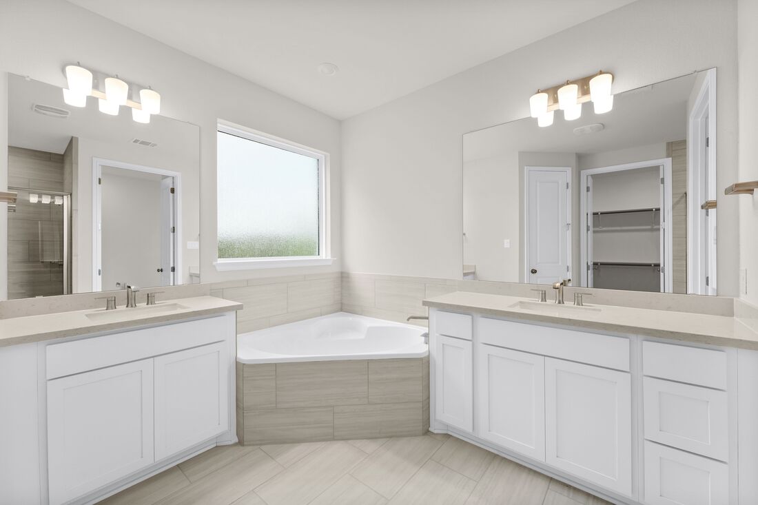 1821 Plum Tree Way Georgetown, TX 78628 - Photo 5 of 35 a bathroom with a sink double vanity and a mirror