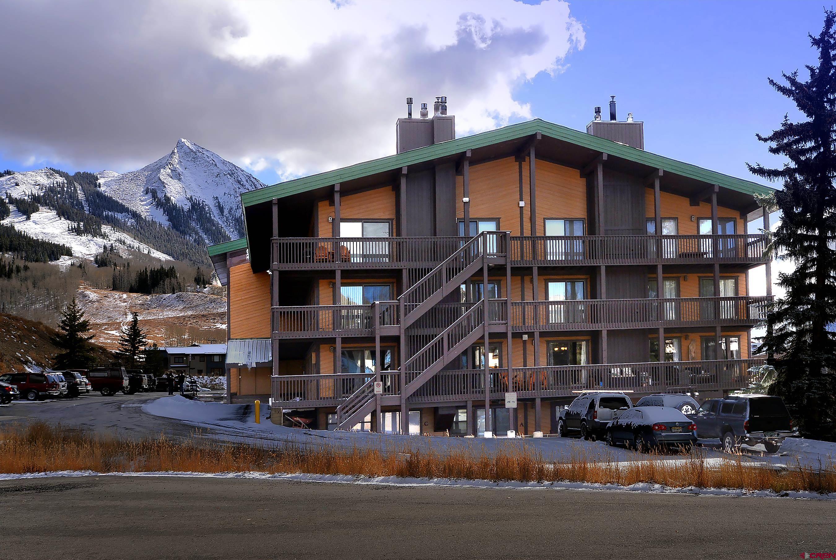 35 Emmons Road, Unit 3 Crested Butte, CO 81225 - Photo 23 of 25 a view of building with an outdoor space and lakeside