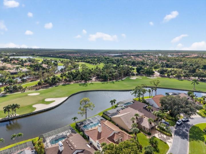 43 Grey Wing Point Naples, FL 34113 - Photo 13 of 50 Aerial view of residential area with a golf course and a nearby body of water