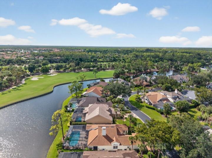 43 Grey Wing Point Naples, FL 34113 - Photo 2 of 50 Aerial view of residential area featuring a large body of water and a golf course
