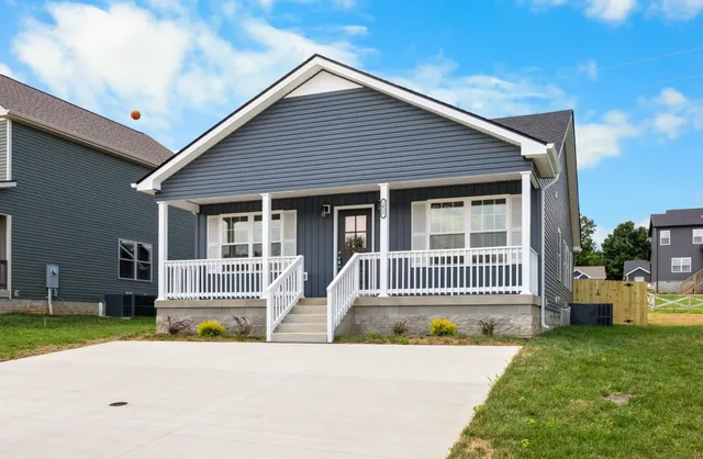 a house view with a garden space