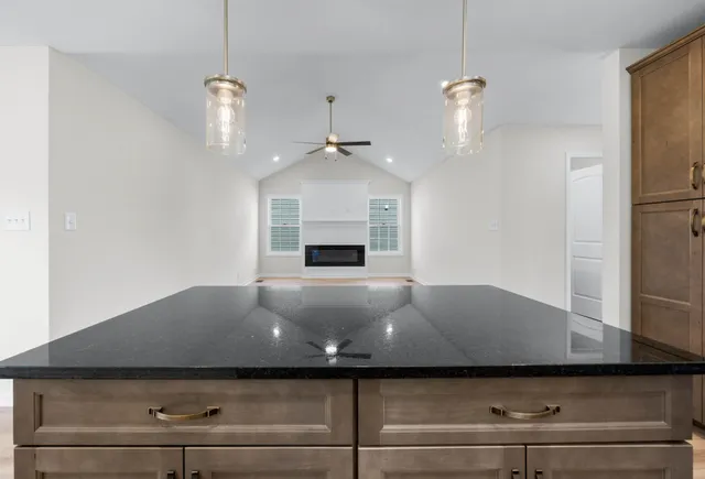 a view of livingroom and kitchen island
