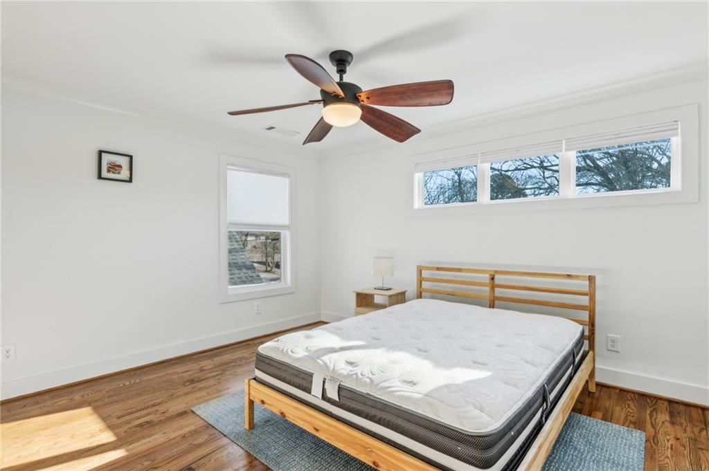 1237 Milton Terrace Southeast Atlanta, GA 30315 - Photo 21 of 28 a bedroom with a bed and a window