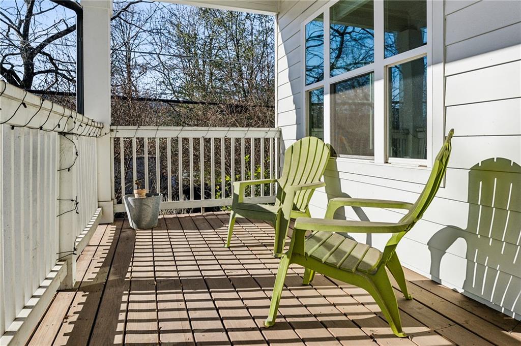 1237 Milton Terrace Southeast Atlanta, GA 30315 - Photo 3 of 28 a view of a balcony with wooden floor