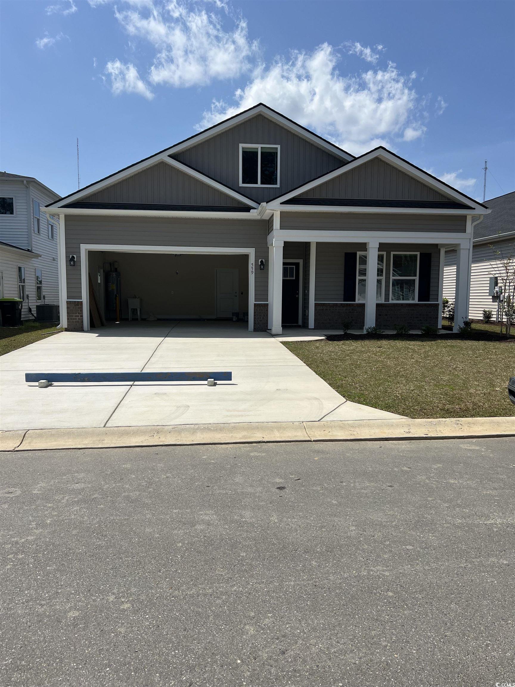 559 Beckham Court Murrells Inlet, SC 29576 - Photo 1 of 6 Craftsman inspired home with a porch, a front yard