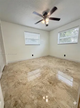 $4,377 | 6527 Northwest 2nd Street, Pompano Beach, FL 33063
