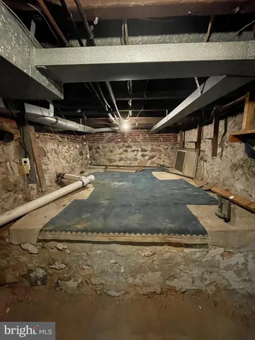 a view of a patio with table and chairs and potted plants