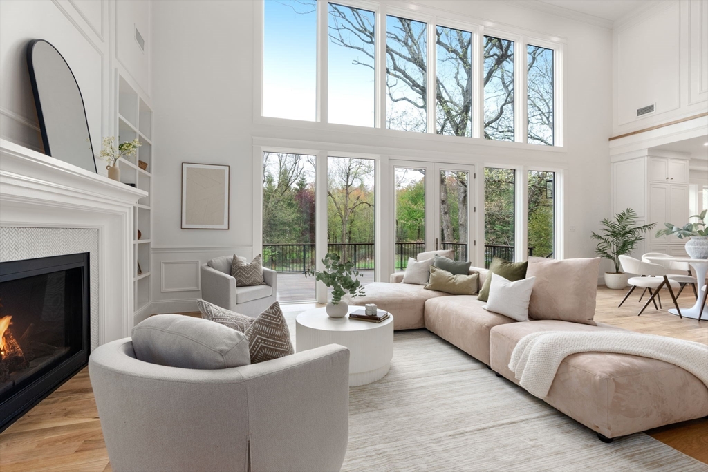 82 Deer Path Lane Weston, MA 02493 - Photo 4 of 42 a living room with furniture and a large window