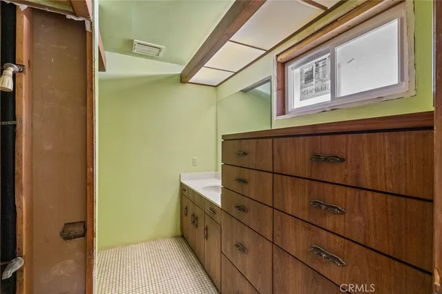 a view of a hallway with a window