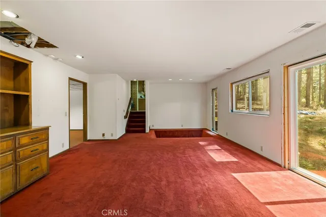 an empty room with windows